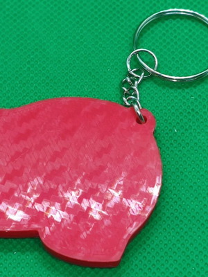Fire helmet keychain like new with two-color print