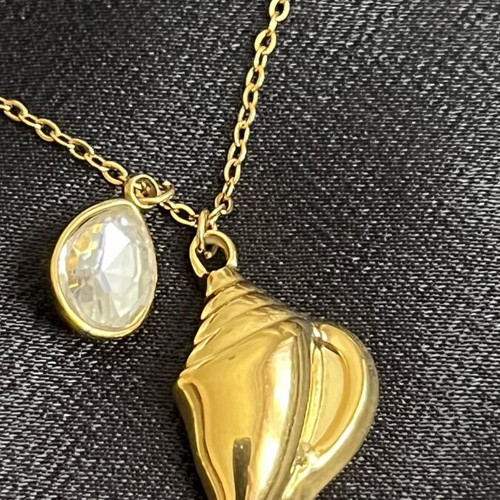 Necklace with shell and zircon, new, gold tone stainless steel