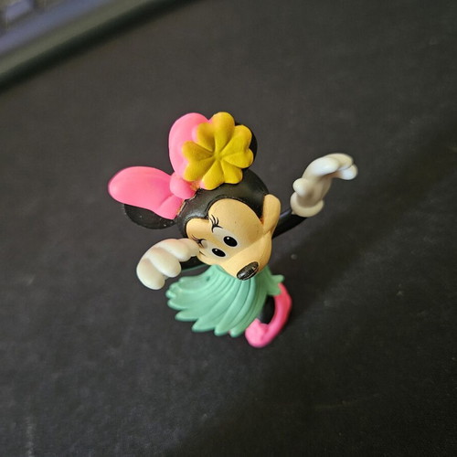 Peppa and Minnie figures used with minor paint wear