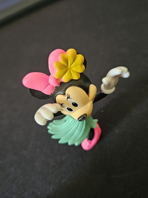 Peppa and Minnie figures used with minor paint wear
