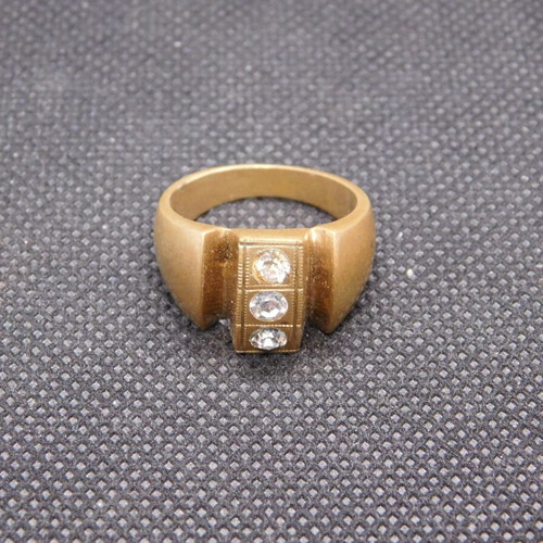 Brass ring with 3 zircon stones