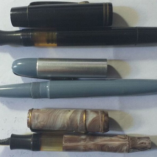 Set of 3 collectible pens with gold plating and slightly deformed body