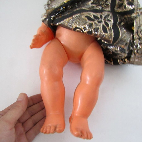 Vintage souvenir doll with traditional oriental costume used
