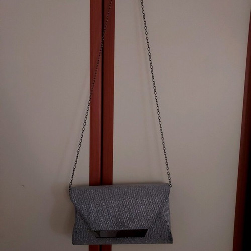 Tsoukalas Shoes silver hand bag like new formal