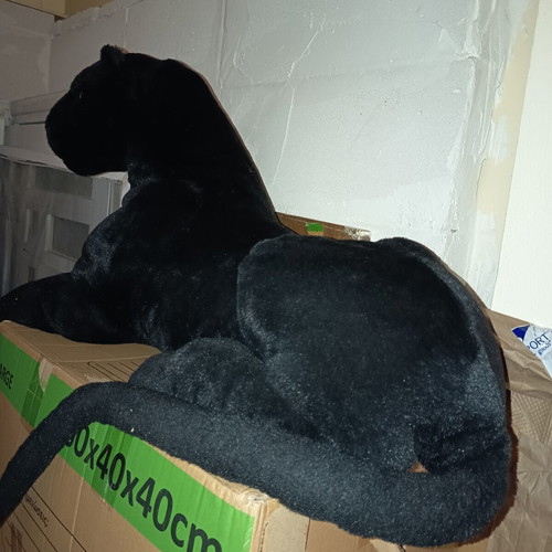 Large plush black panther with blue eyes, like new