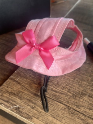 Dog hat pink with bow size small like new