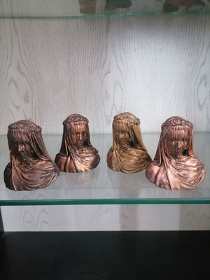 Sculptures set of 4 new, plaster with metallic spray