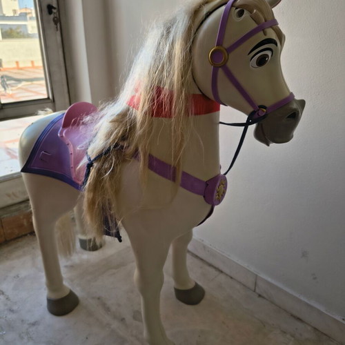 Jakks Pacific Maximus rocking horse toy with sounds used, colorful