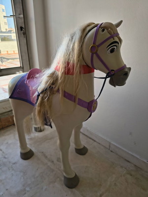 Jakks Pacific Maximus rocking horse toy with sounds used, colorful