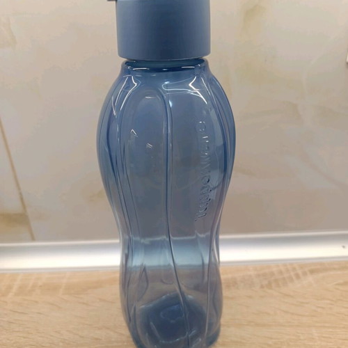 Tupperware 1-liter bottle new, light blue with spout