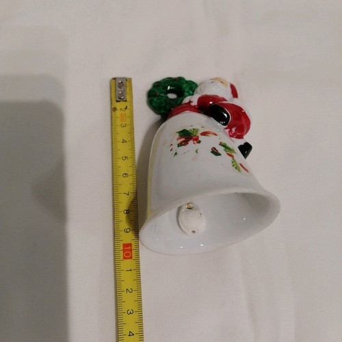 Ceramic bell like new with Santa Claus and wreath