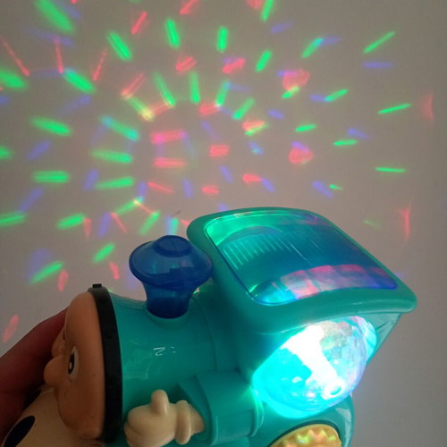 Cute Train toy with sounds, lights and movement, used