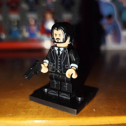 John Wick figure like new with base and accessories