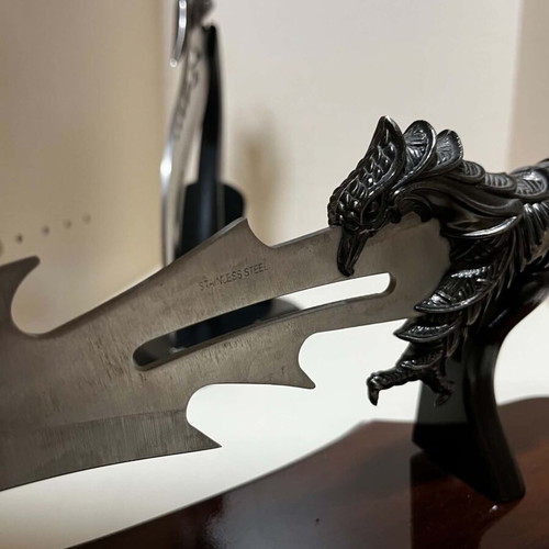 Decorative knife set with ornate handles