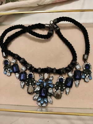 Statement necklace used with black twisted cord and gemstones
