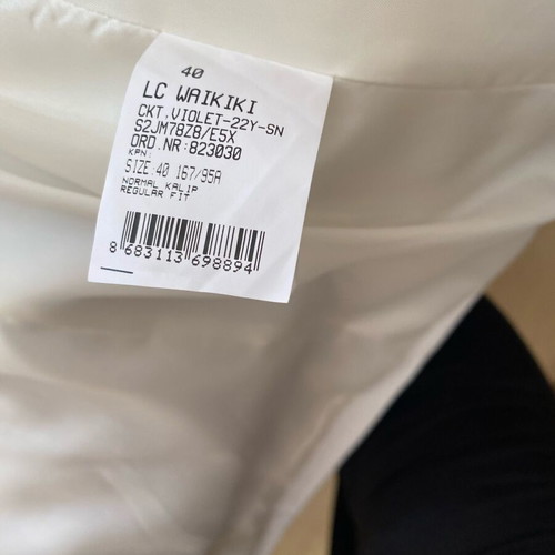 White jacket like new size large Waikiki