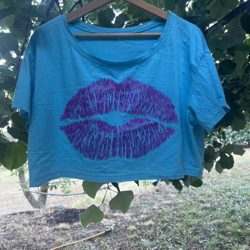 CropTop t-shirt turquoise like new with glow-in-the-dark print