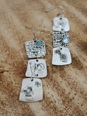 Egyptian Earrings new, silver-plated embossed metal