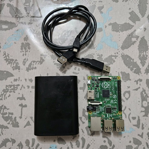 Raspberry Pi model b like new with case and usb charging cable