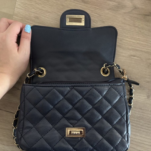 Shoulder bag blue like new with gold details