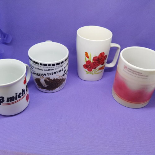 Ceramic cups used, set of 4 different pieces