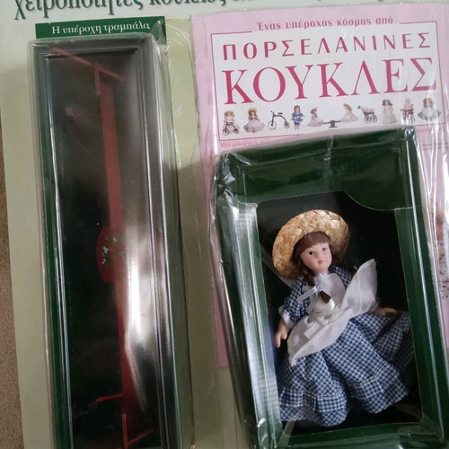 Porcelain doll with wooden seesaw miniature new