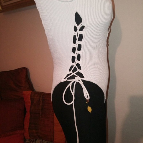 One-piece swimsuit used, white, size M with laces