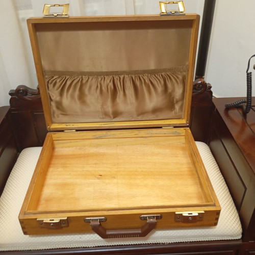 Vintage wooden suitcase made of genuine teak wood, used