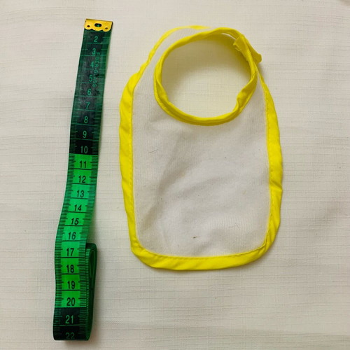 Clothes for large dolls used, swimsuit with defect and bib