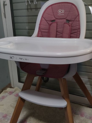 Kinderkraft high chair used with feeding accessories