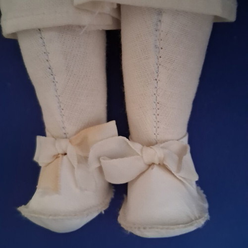 Vintage Slavic doll with porcelain head and fabric body