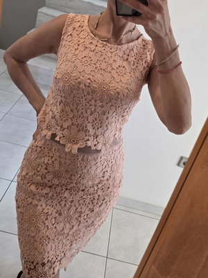 Lace dress in salmon peach shade with floral pattern and waist detail