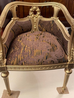 Pair of Louis XVI style armchairs with gold leaf finish and damask upholstery