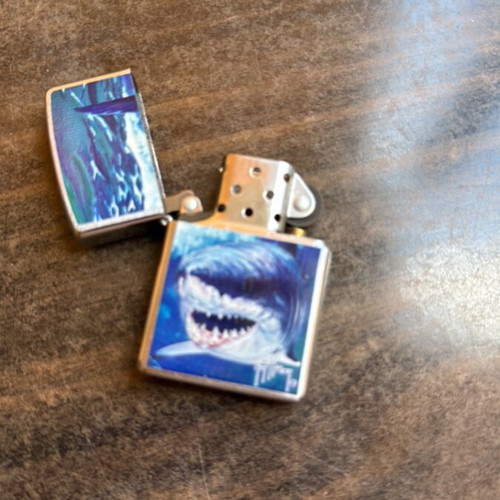 Zippo lighter like new with shark design