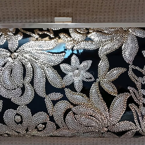 Clutch bag with floral gold sequin embroidery and matching wallet