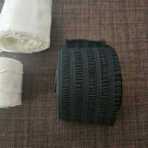 Curtain tapes and wide black elastic like new