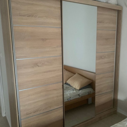 Three-door sliding wardrobe like new