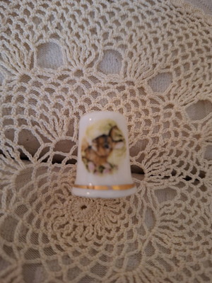 Porcelain thimble with rabbit, flawless and sealed