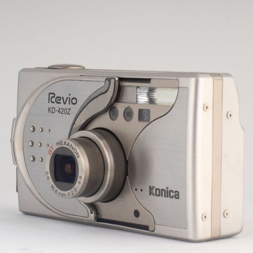 Konica Revio KD-420Z 4MP Digital Camera used with Battery Charger and 2GB SD Card
