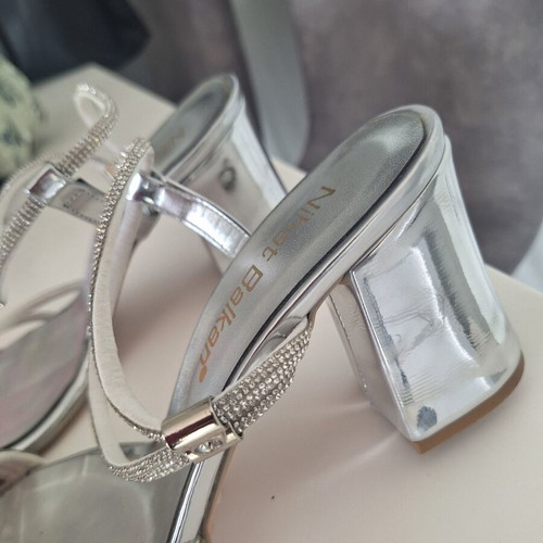 Silver high heel shoes size 39