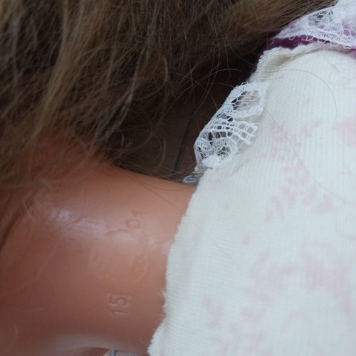 Vintage doll with unique handmade clothes like new