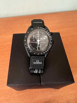 Swatch MoonSwatch Mission to the Moonphase watch, black and white