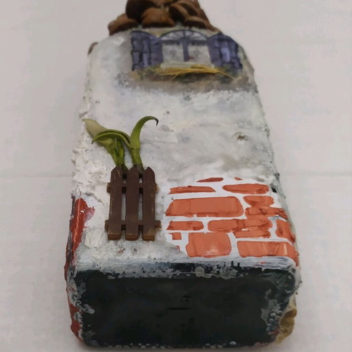 Decorative house used, made from bottle