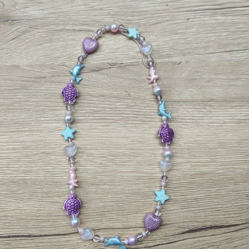 Children's necklace new with dolphins and stars purple and turquoise
