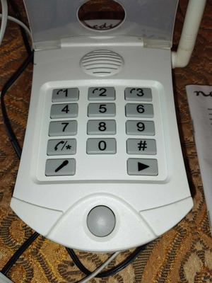 Wireless emergency call device with 2 wireless remotes used