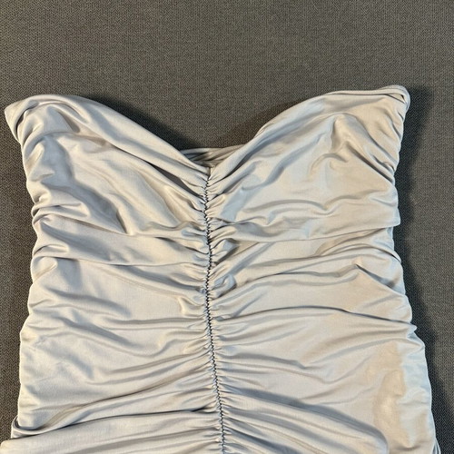 Strapless top used, ice color with decorative gathers