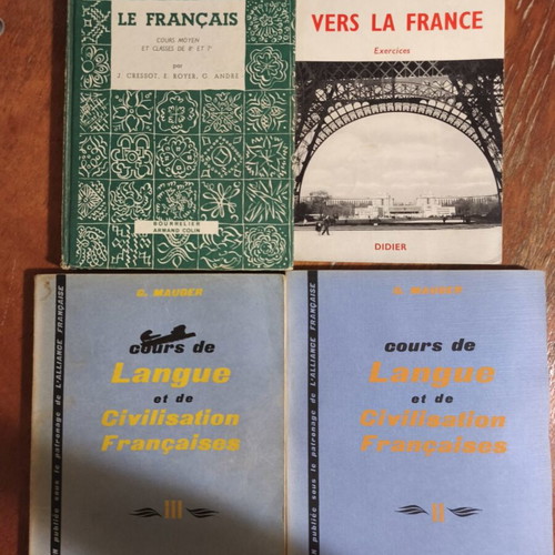 French language learning books used with wear and markings