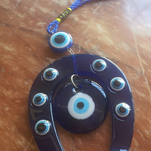 Gouri horseshoe with evil eye charm