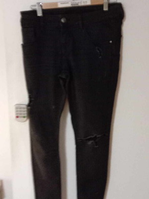 Jeans used, black with rips, size M
