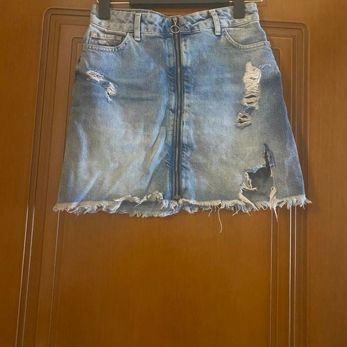 Zara denim skirt with rips used, front zipper